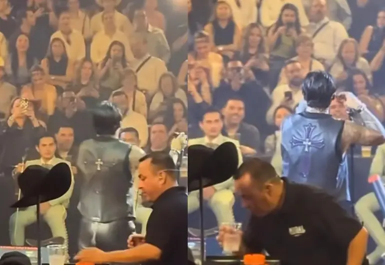 Video muestra al staff de Christian Nodal oliendo y retirando sus bebidas en pleno concierto