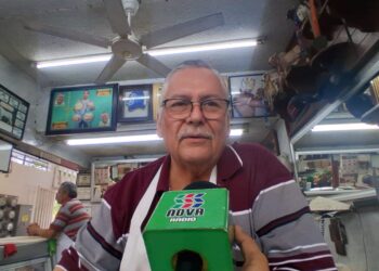 Carniceros del mercado Independencia esperan repunte de ventas con la llegada de diciembre.